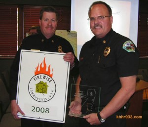 CalFire Deputy Chief presents the Firewise Communities/USA distinction to Big Bear City Fire Chief Jeff Willis