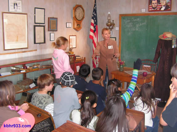 Museum curator Kim Sweet leads a field trip in the Mt. Doble schoolhouse, which was used in the Big Bear Valley as early as 1901.