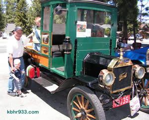 All in the family: Stan O'Dell's 1914 Model T was a crowd favorite. Here, Stan is pictured with great-grandsons KJ and Kaden and the Model T which reads "O'Dell and Sons".