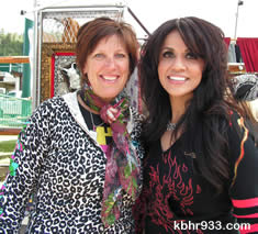Big Bear Choppers' Mona Alsop (right) made a visit to local artist Jeannie Houston Antes' booth displaying her vibrant and funky mosaics.