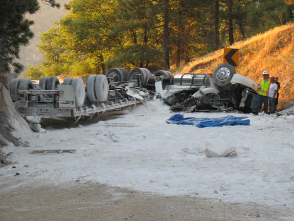 This overturned truck resulted in a 13-hour closure of Highway 330.