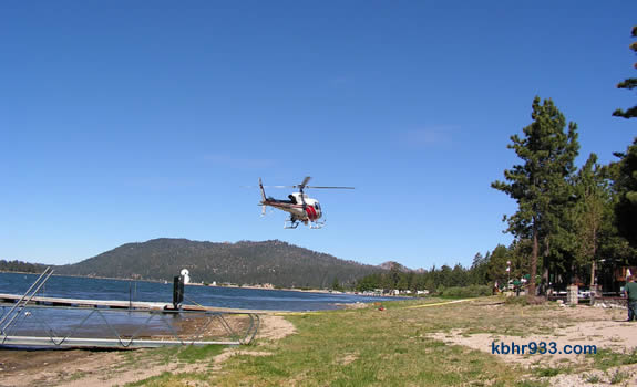 The San Bernardino County Sheriff's Department helicopter, "40 King," arriving on Big Bear Lake's North Shore, just east of the observatory and in front of the Big Bear Shores RV Park. This is the helicopter that transported the Sheriff's Department diving team, which assisted in the recovery.