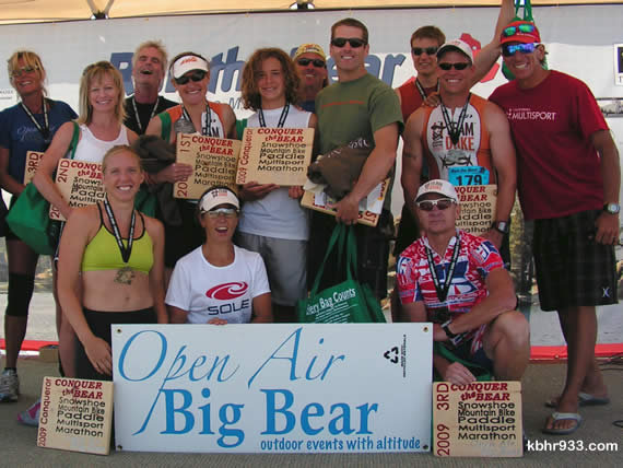 The Bear is conquered: The final crew of Conquer the Bear assembles for one last time this season, accompanied by event co-organizers Karen Lundgren (in front) and Paul Romero (far right).