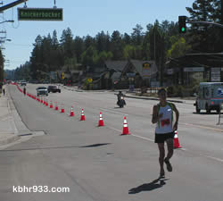 Kevin Magdiel, age 17, has an impressive lead in the home stretch of the half-marathon, and ultimately takes second place.