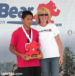 Thirteen-year-old Bobby Morales (with Event Director Beth Gardner) ran to a third overall finish in the 5K, just behind his BBHS cross-country coach.
