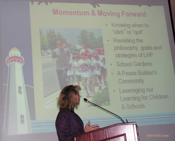 Beth Gardner of the Lighthouse Project explains that they plan to channel their momentum from the 2008 Move a Million Miles for Ryan Hall campaign (pictured on PowerPoint) and the Run the Bear Marathon into a 2011 run around Big Bear Lake billed as Run Ryan's Run--rather than organizing another marathon. The non-profit also plans to refocus their energies on building a child-honoring community.