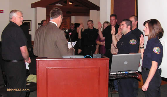 Prior to passing the gavel to Liz Harris, outgoing Mayor Rick Herrick did the swearing in of new paid call firefighters Jared Cheek, Jenny Plumhoff, Brian Geary, Brandon Draucker and Carl Birkholm.