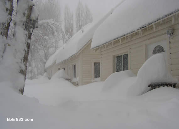 24 hours later... the same houses, buried, as of Friday morning as our epic storms continue.